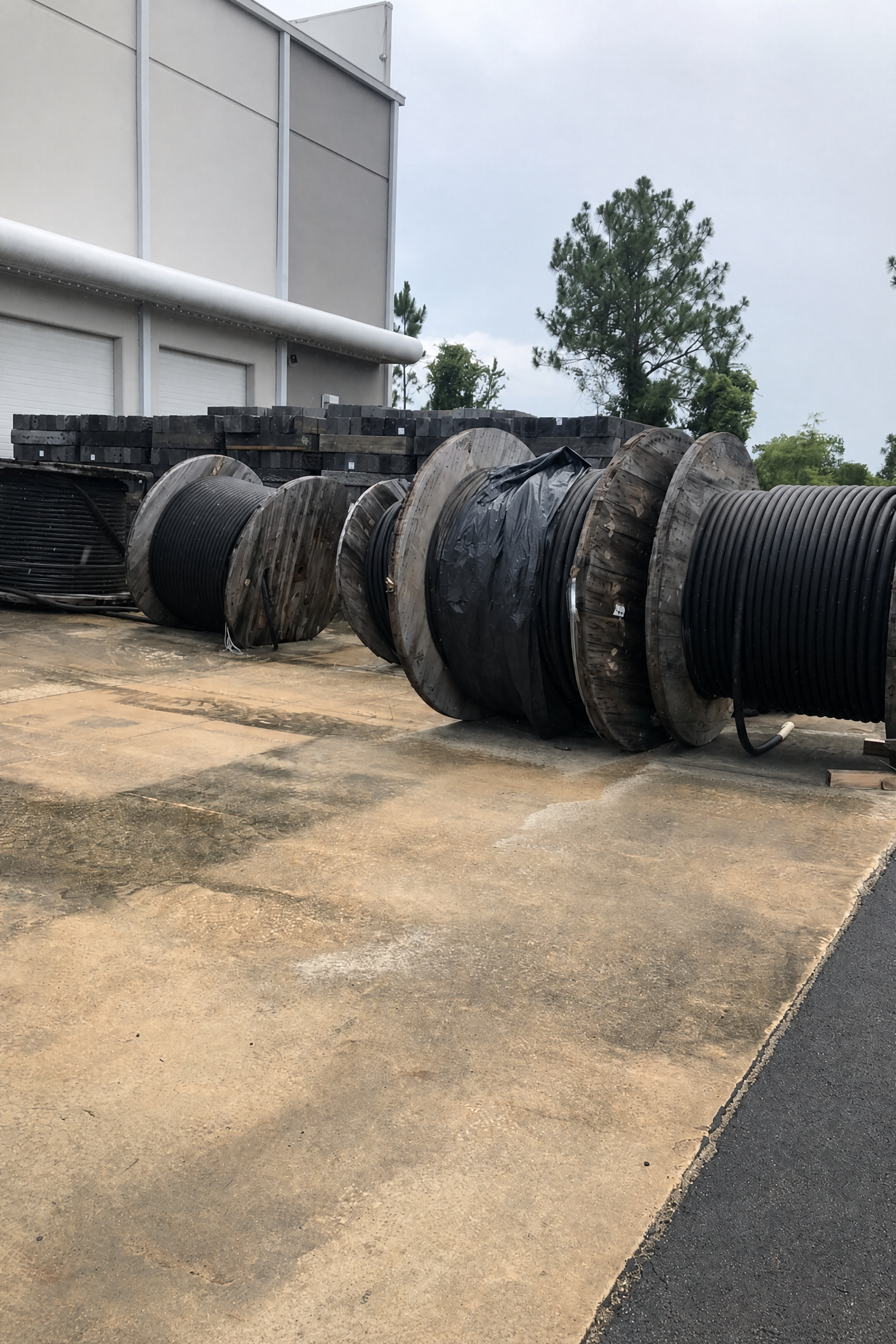 Large commercial cable reels staged for inventory review