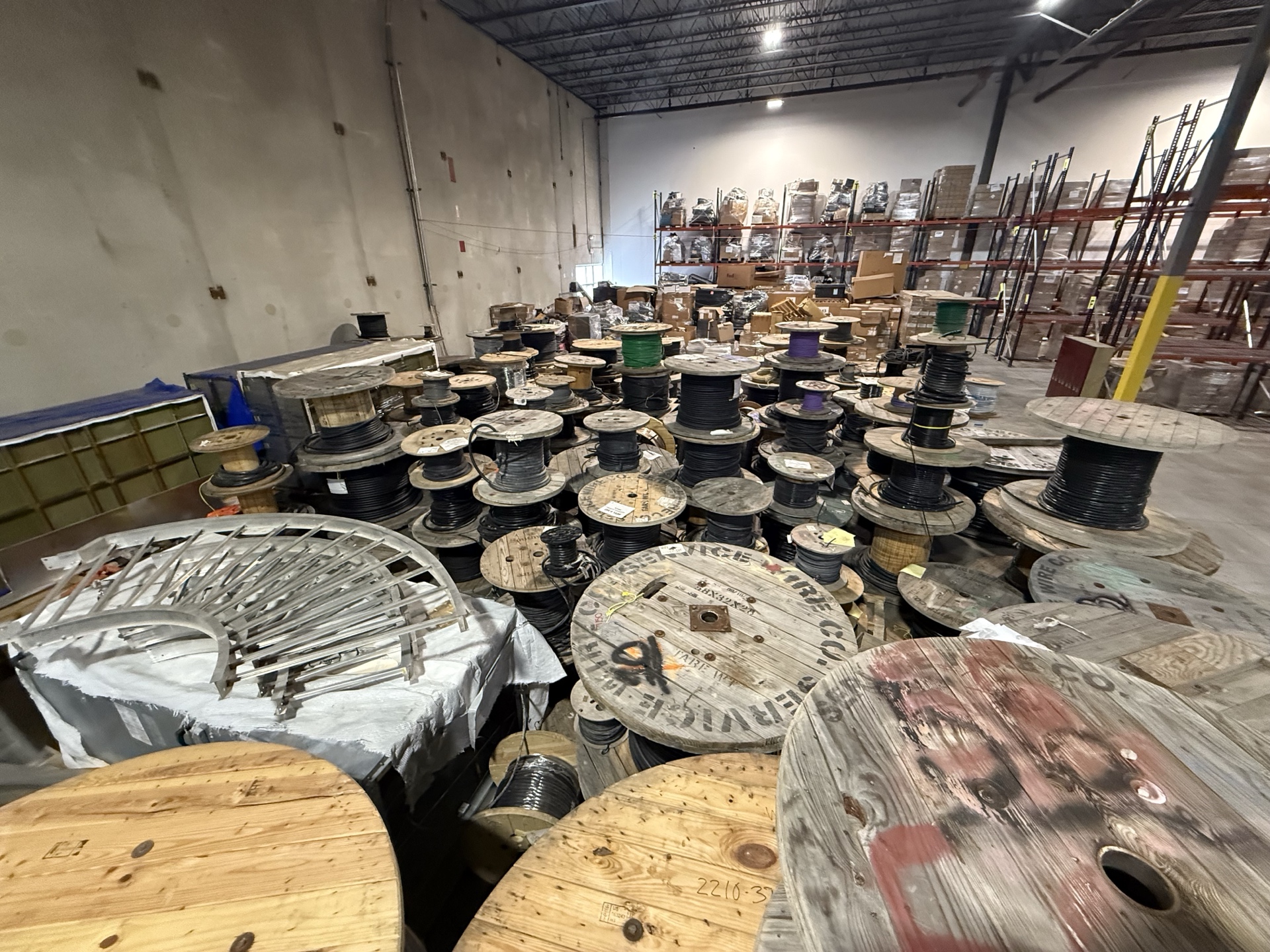 Commercial electrical wire reels and packaged inventory prepared for review